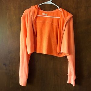 Cropped orange zip-up hoodie